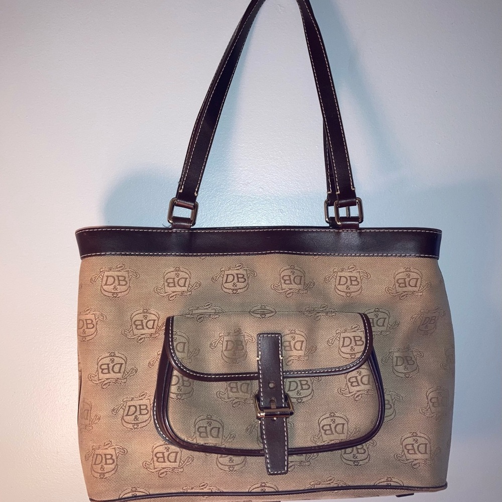 Dooney & Bourke East West Shoulder Bag with Signature Monogram Logo. 